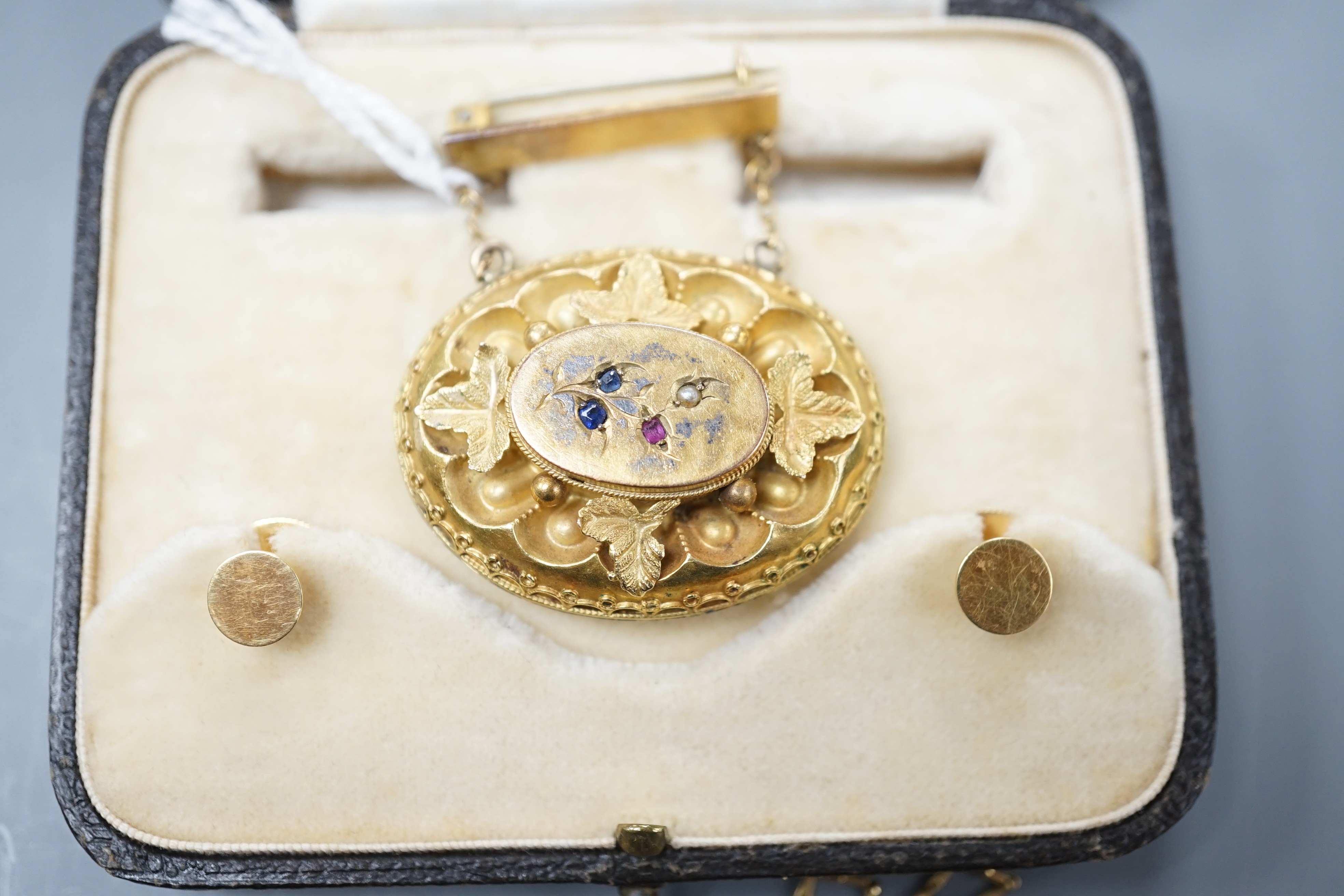 A 22ct gold wedding band 2.3 grams, a Victorian yellow metal and gem set oval brooch and other jewellery